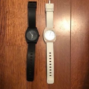 Black and white Nixon watches